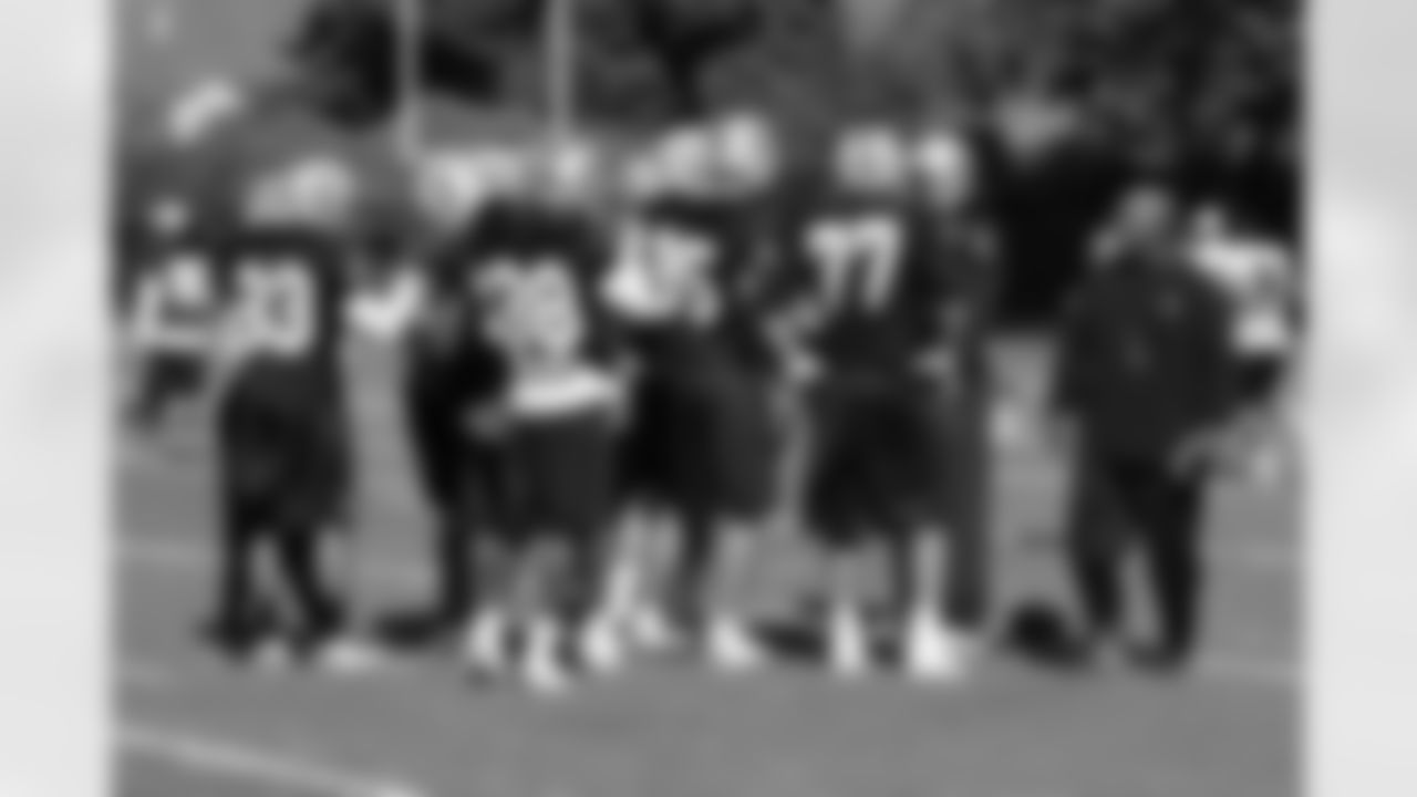 Head Coach Hue Jackson with defense.