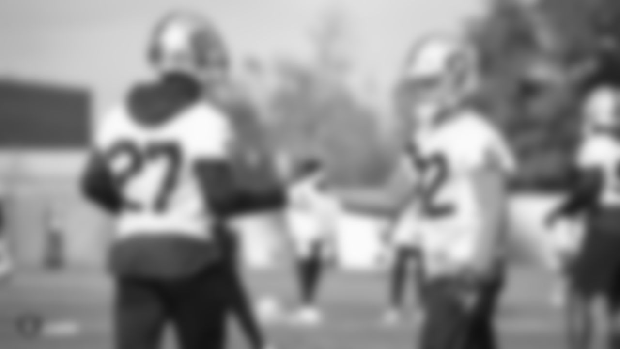 Raiders cornerback Trayvon Mullen (27) and safety Dallin Leavitt (32) during practice.