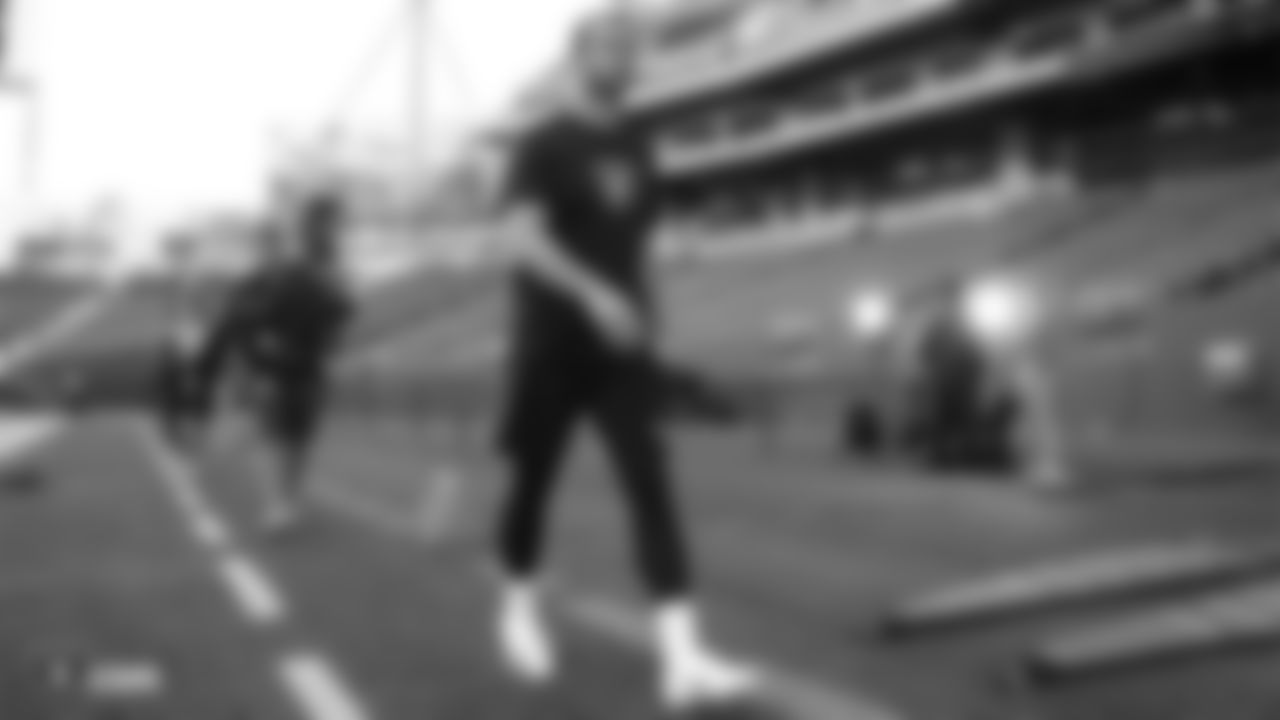 The Raiders on the field before their preseason game against the Green Bay Packers at IG Field.