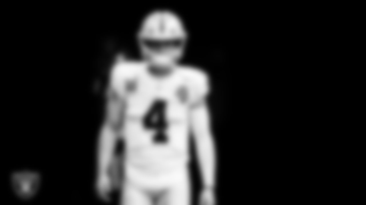 Las Vegas Raiders quarterback Derek Carr (4) walks down the tunnel before the regular season away game against the New England Patriots.