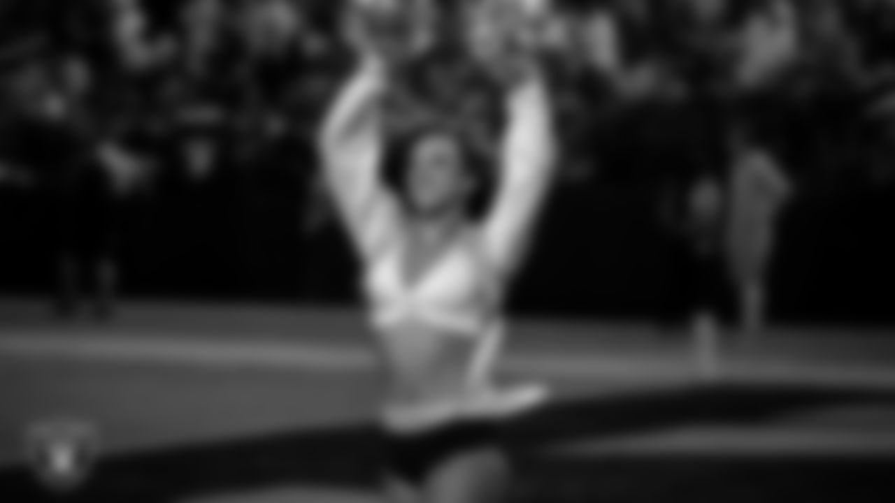 Raiderette Lexie performs on the field during the regular season home game against the Green Bay Packers at Allegiant Stadium.