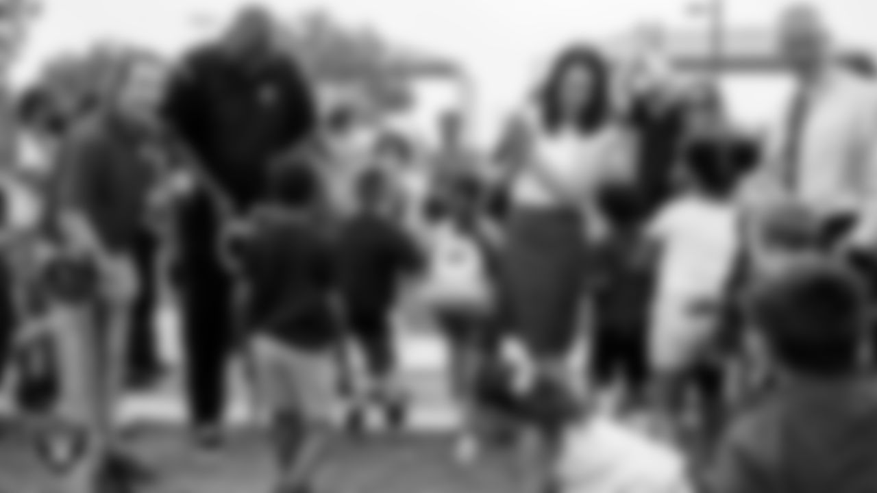 Students from the Vegas Strong Academy rush to the playground after the ribbon cutting of the new playground as part of the Fox5 Super Build at Gary Reese Freedom Park.