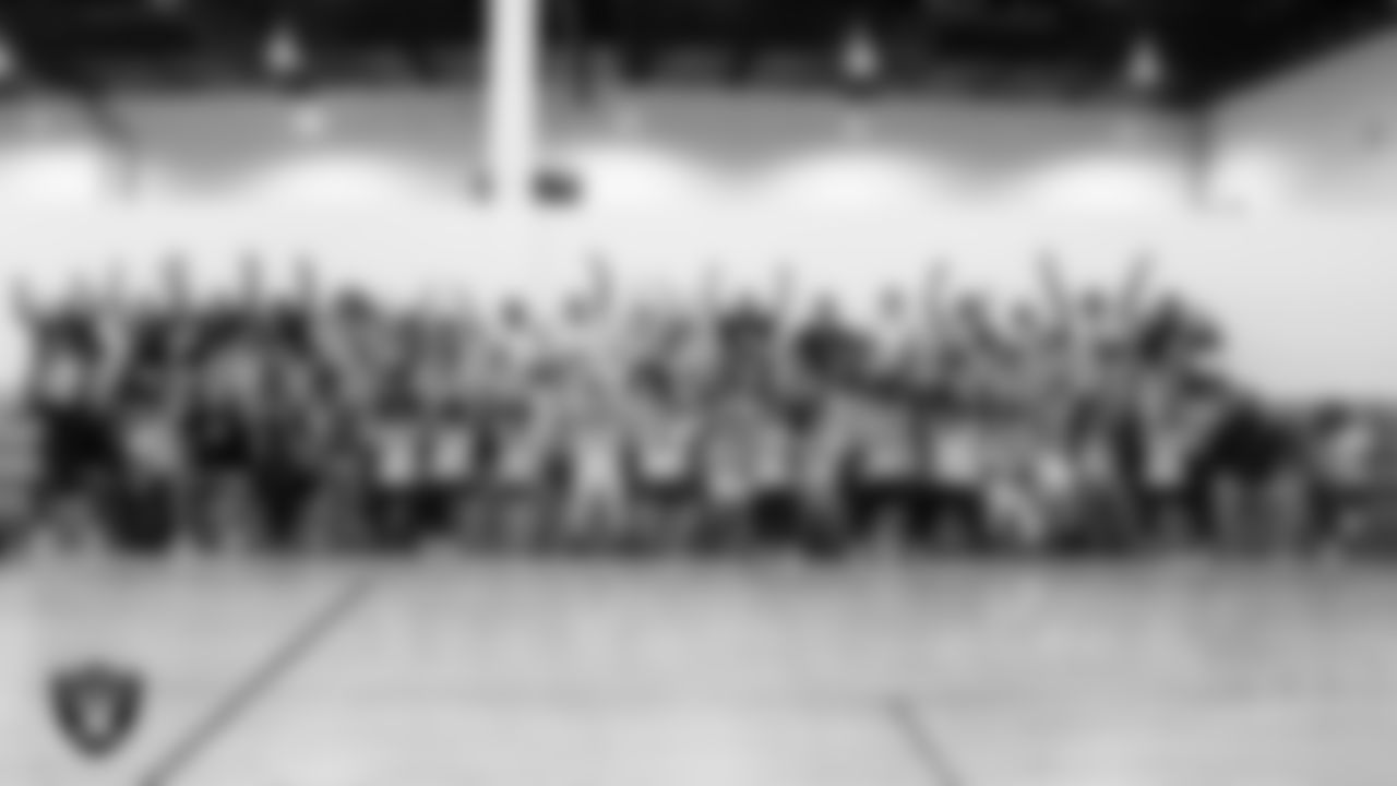 The Las Vegas Raiders Rookie class and members of the Boys & Girls Club of Southern Nevada pose for photo after the Raiders Junior Training Camp.
