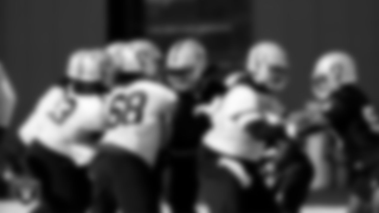 Las Vegas Raiders offensive lineman Andre James (68), defensive end Kendal Vickers (91), offensive lineman Erik Magnuson (62) and linebacker Nicholas Morrow (50) during practice at Intermountain Healthcare Performance Center.
