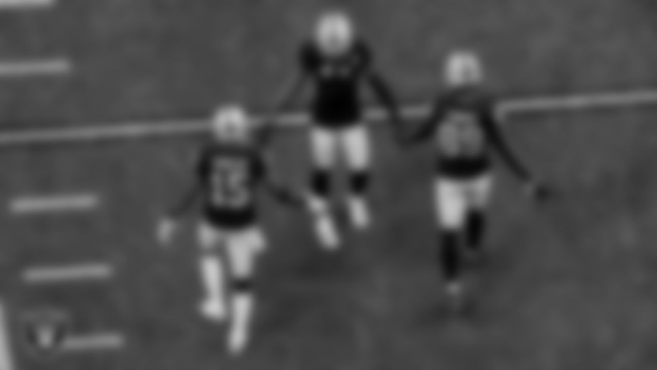 The Raiders warm up before the regular season game against the Indianapolis Colts at Allegiant Stadium.