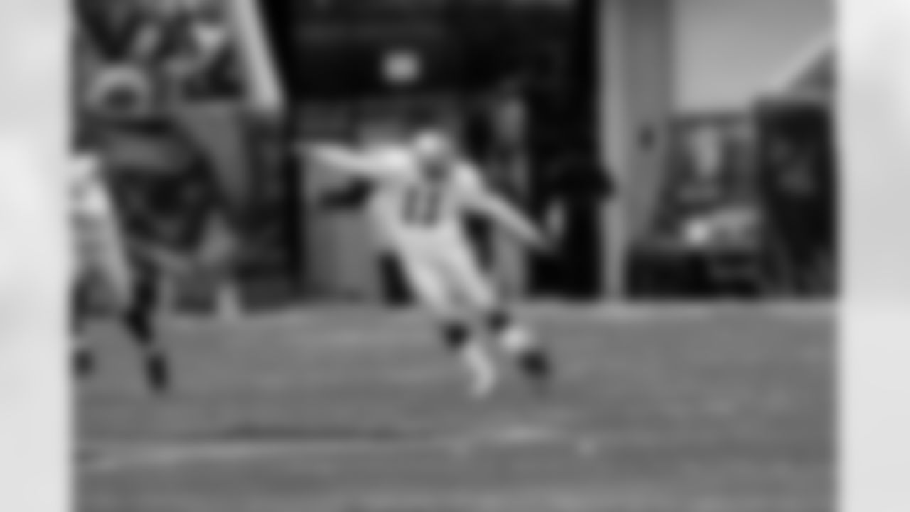 K Sebastian Janikowski kicks off.