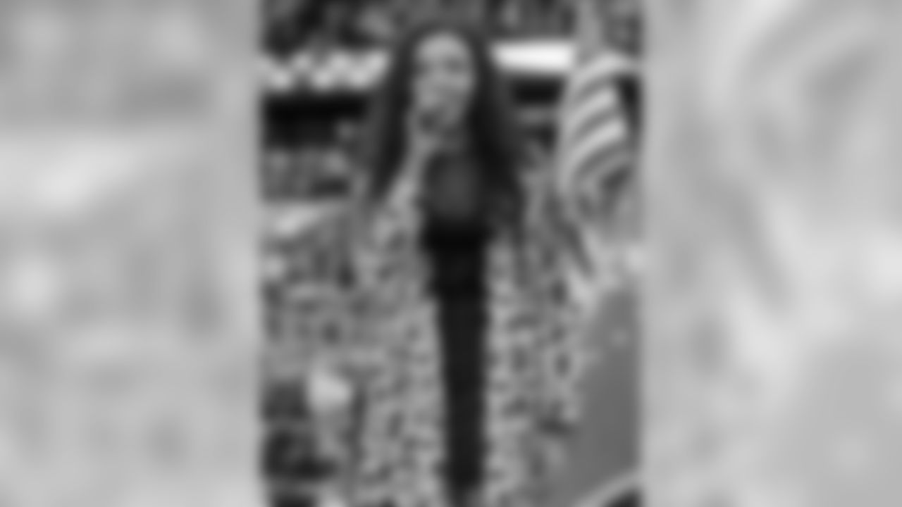 Singer Tinashe performs the national anthem before the Raiders regular season game against the Chicago Bears.