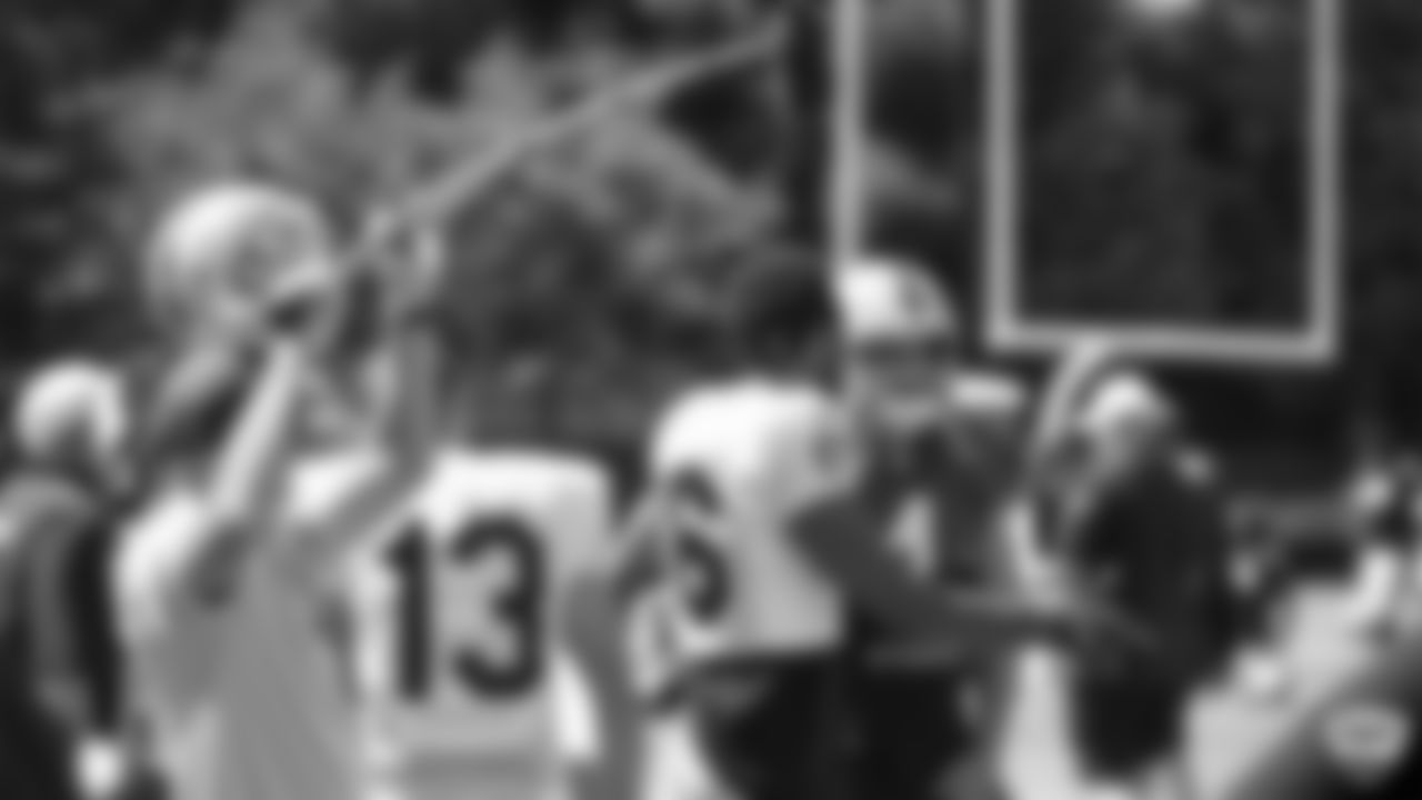 Raiders wide receiver Tyrell Williams (16) and quarterback Derek Carr (4) on the field for practice at 2019 Training Camp.