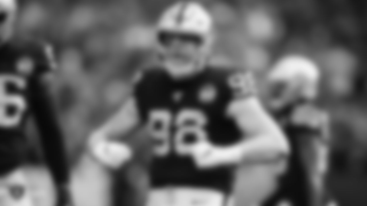 Raiders defensive end Maxx Crosby (98) celebrates during the regular season game against the Tennessee Titans.