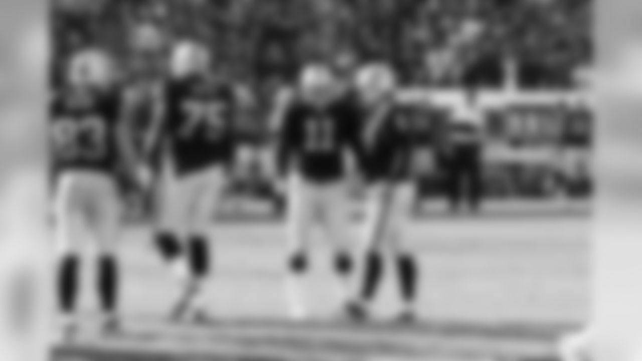 Pro Bowl bound K Sebastian Janikowski and P Shane Lechler congratulate each other on another successful field goal.