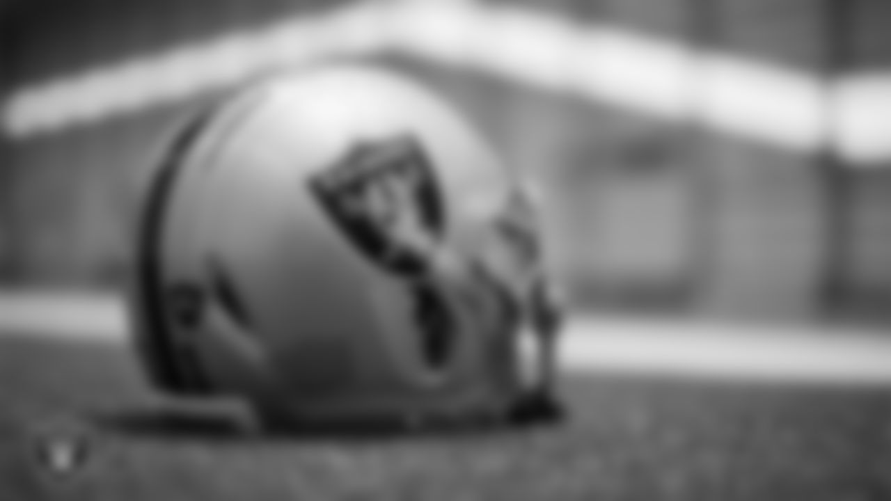 Las Vegas Raiders running back Peyton Barber's (31) helmet on the field during practice at Intermountain Healthcare Performance Center.