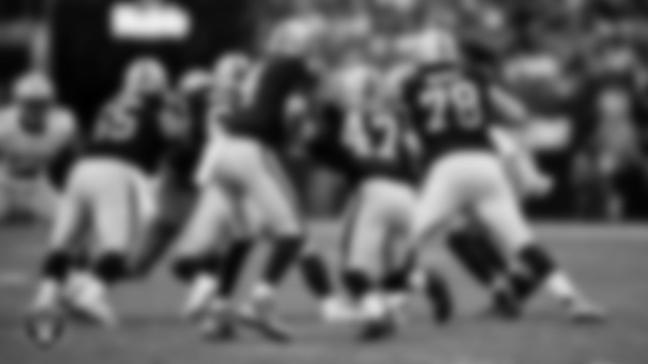 Las Vegas Raiders quarterback Aidan O'Connell (4) hands the ball off to running back Sincere McCormick (47) during the preseason home game against the San Francisco 49ers at Allegiant Stadium.