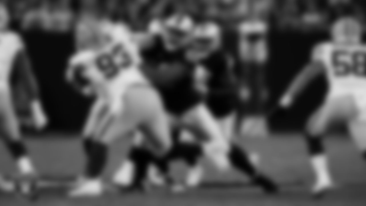 Las Vegas Raiders guard Dylan Parham (66) blocks during the regular season home game against the Green Bay Packers at Allegiant Stadium.