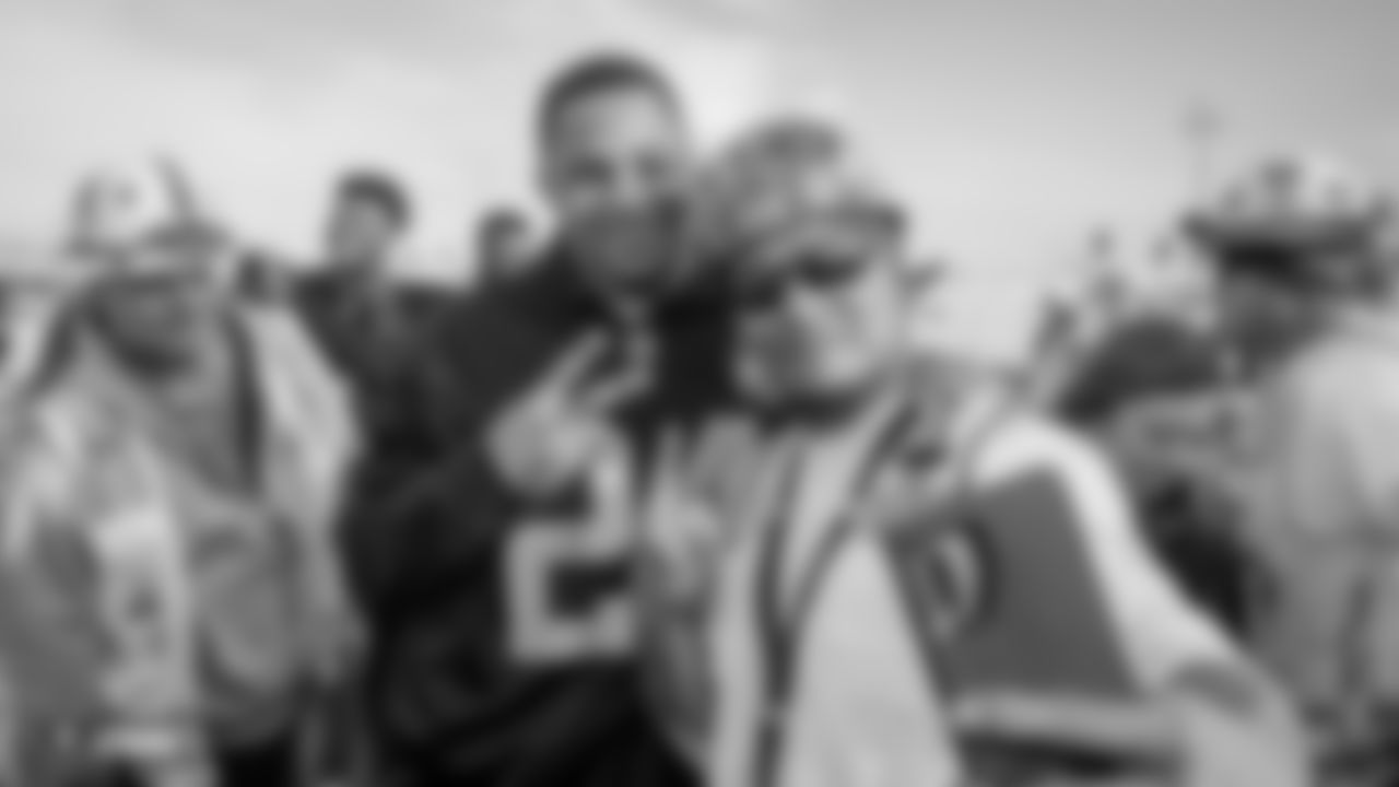Raiders safety Johnathan Abram (24) takes a selfie with a construction worker following an official announcement of the Raiders changing their name to the Las Vegas Raiders.