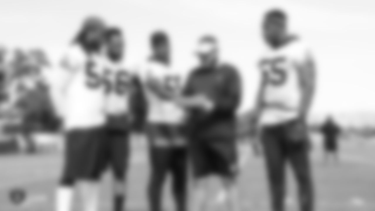 Oakland Raiders linebacker Emmanuel Lamur (54), linebacker Derrick Johnson (56), linebacker Tahir Whitehead (59), linebackers coach David Lippincott. and linebacker Marquel Lee (55) on the field for practice at the Oakland Raiders Practice Facility, Monday, October 9, 2018, in Alameda, California.