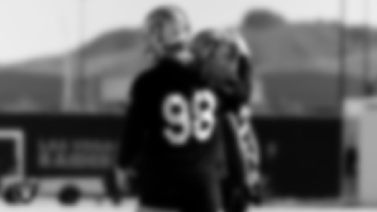 Las Vegas Raiders defensive end Maxx Crosby (98) and safety Erik Harris (25) during practice at Intermountain Healthcare Performance Center.