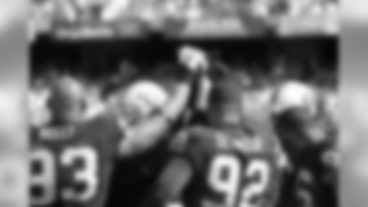 The defense huddles up.