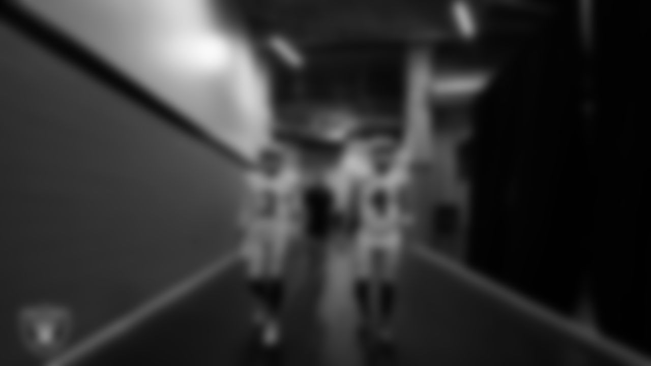 Las Vegas Raiders quarterback Jarrett Stidham (3), quarterback Chase Garbers (15) and quarterback Derek Carr (4) walk down the tunnel before the regular season away game against the New Orleans Saints at Caesars Superdome.