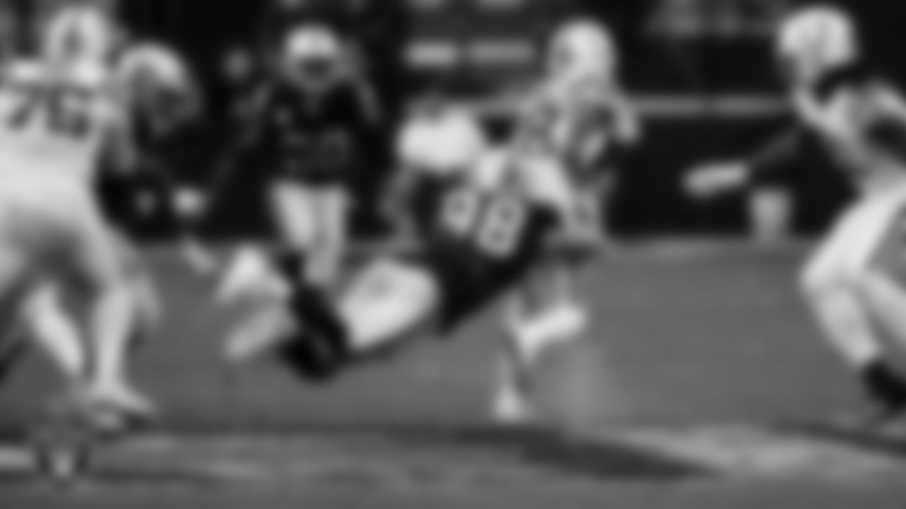 Las Vegas Raiders defensive end Maxx Crosby (98) makes a tackle during the regular season home game against the Indianapolis Colts at Allegiant Stadium.