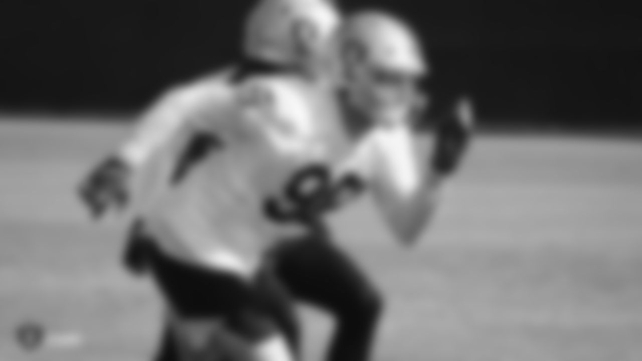 Raiders defensive end Maxx Crosby (98) rushes the quarterback during practice.
