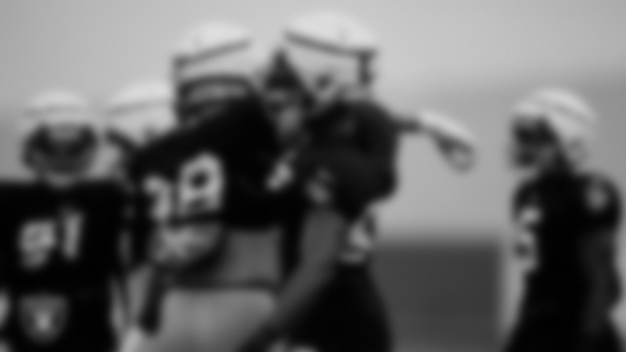 Las Vegas Raiders defensive end Maxx Crosby (98) and defensive end Chandler Jones (55) on the field for practice at 2023 Training Camp at Intermountain Health Performance Center.