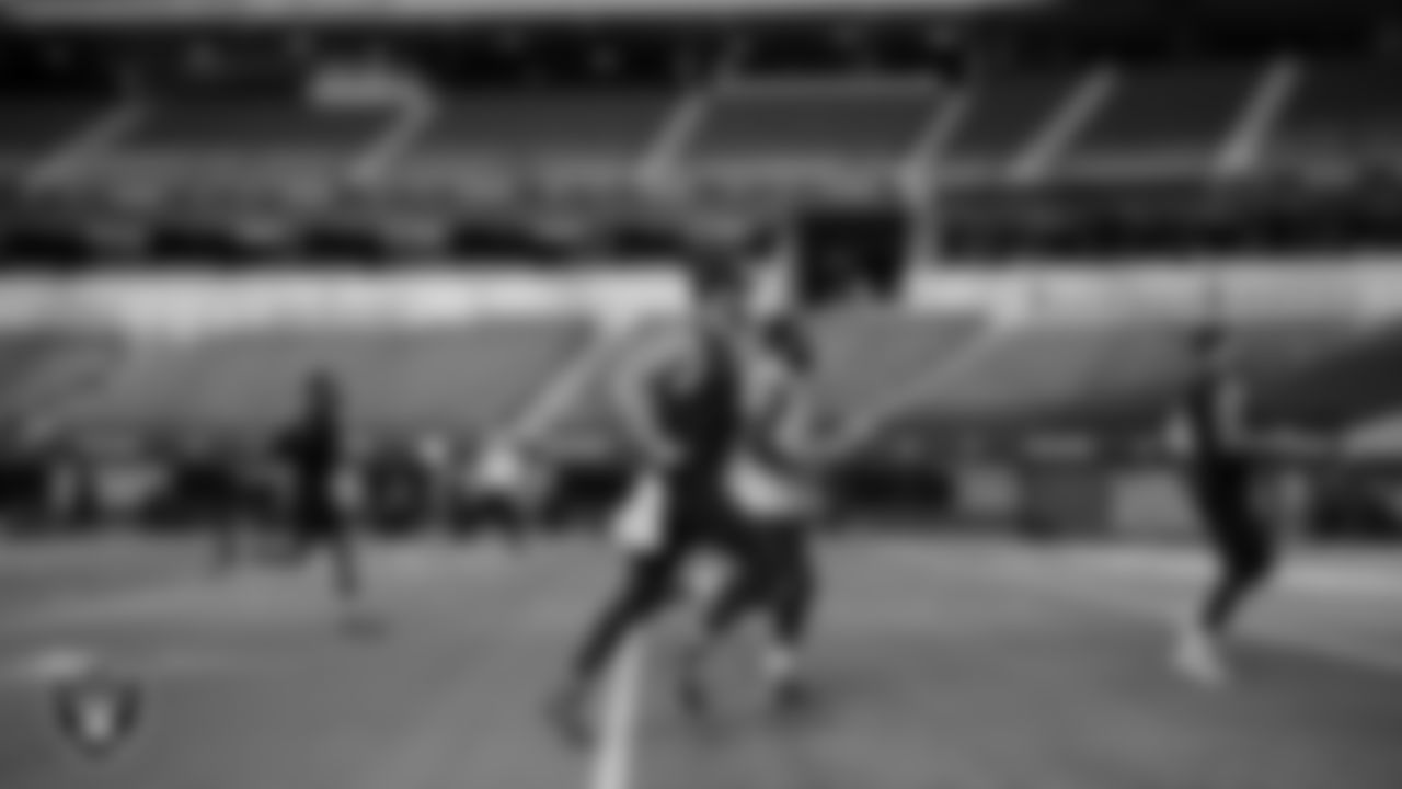 Las Vegas Raiders quarterback Derek Carr (4) warms up before the preseason game against the Los Angeles Rams at SoFi Stadium.