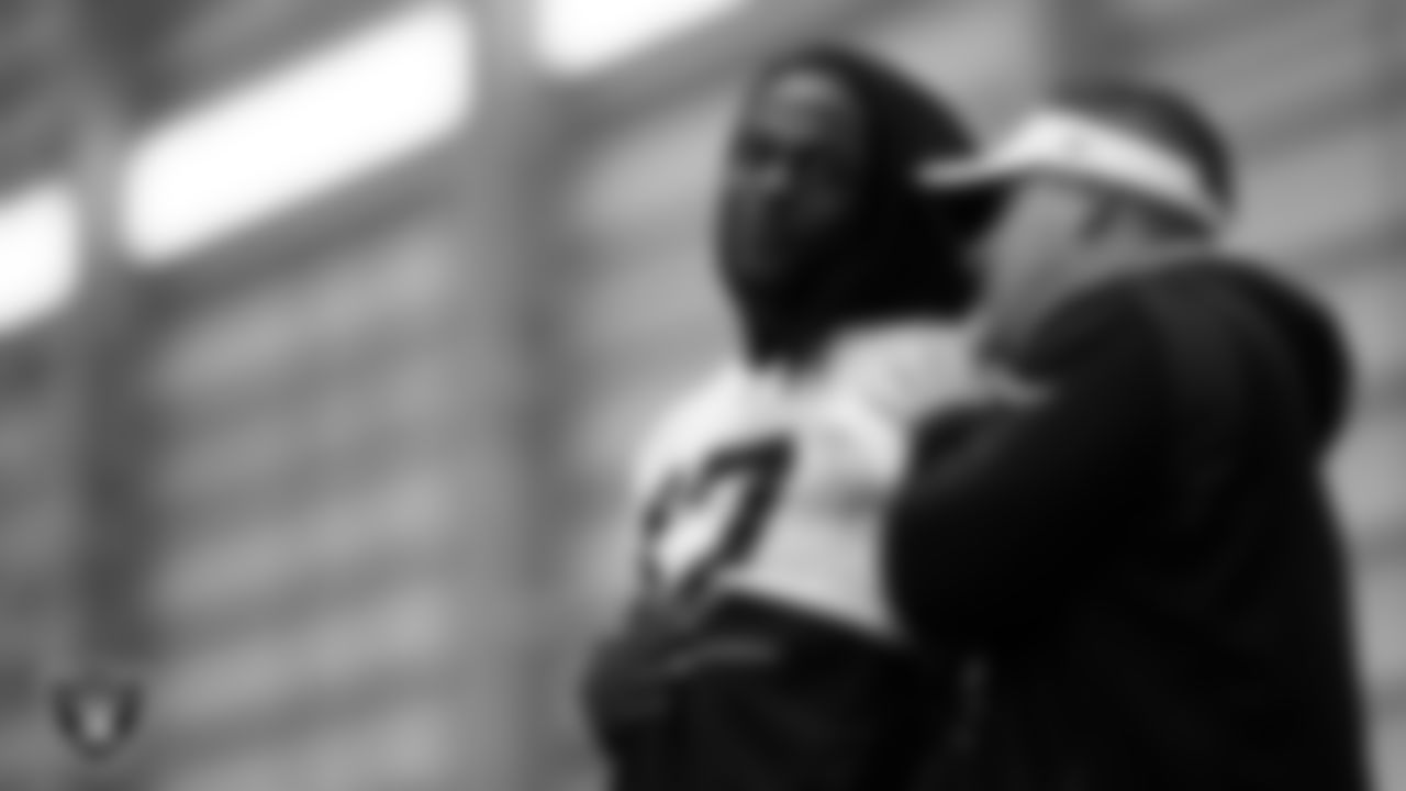 Las Vegas Raiders wide receiver Davante Adams (17) and Head Coach Josh McDaniels during practice at Intermountain Healthcare Performance Center.