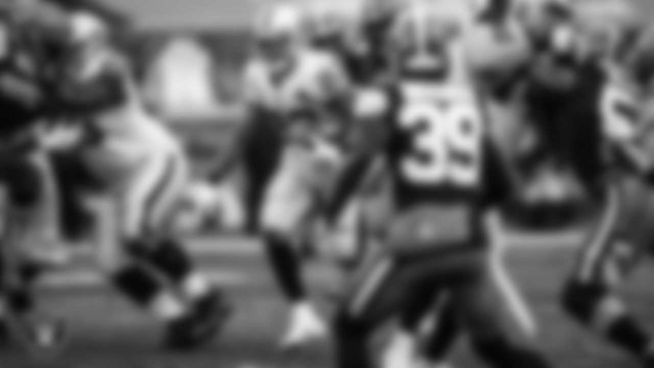 Las Vegas Raiders running back Devontae Booker (23) rushes during the regular season away game against the Cleveland Browns.