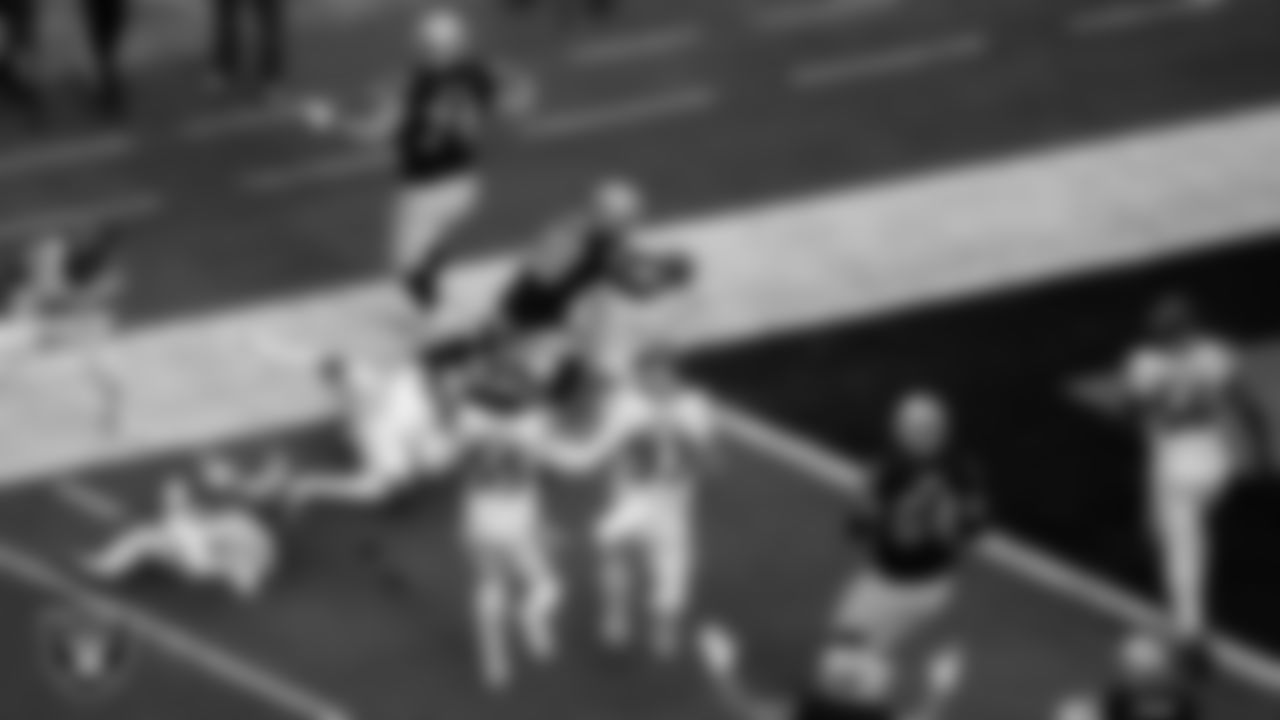 Las Vegas Raiders running back Josh Jacobs (28) rushes for a 4-yard touchdown during the regular season home game against the Houston Texans at Allegiant Stadium.