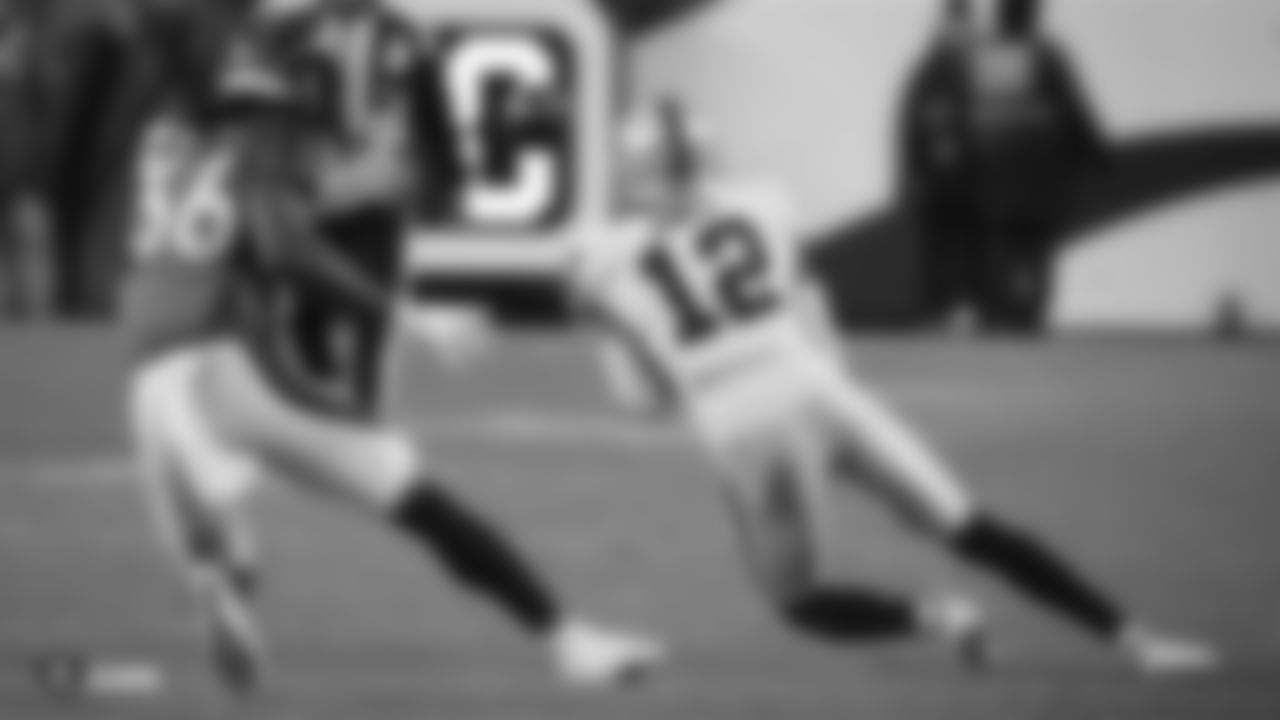 The Raiders during the regular season game against the Denver Broncos at Empower Field at Mile High.