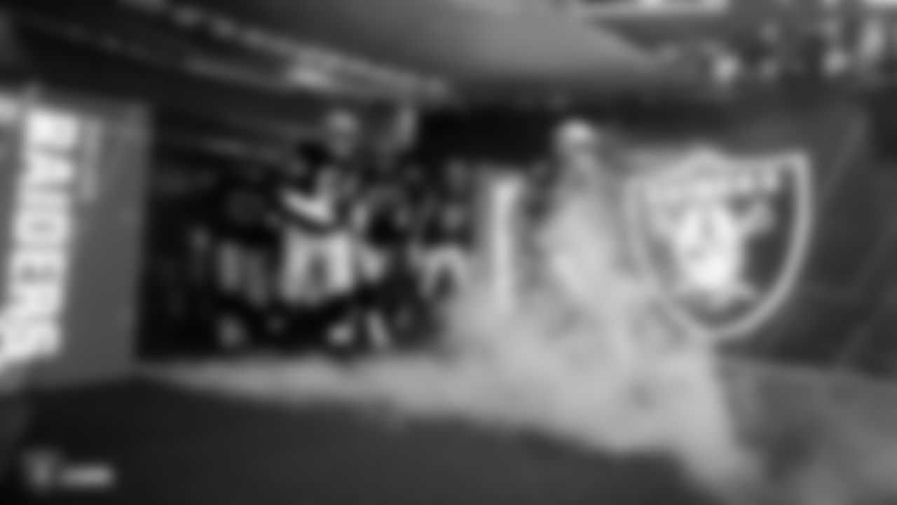 The Raiders are introduced onto the field before the regular season game against the Chicago Bears.