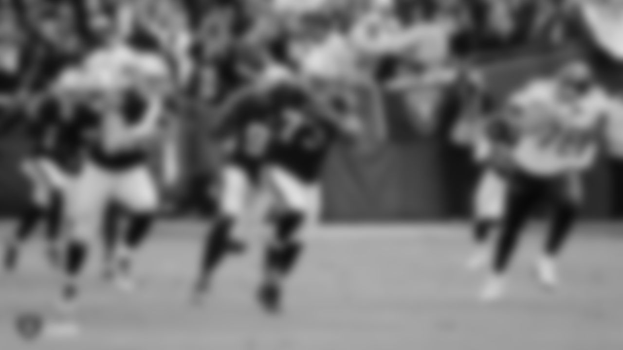 Raiders defensive tackle Maurice Hurst (73) returns an interception during the regular season game against the Tennessee Titans at the Oakland-Alameda County Coliseum.