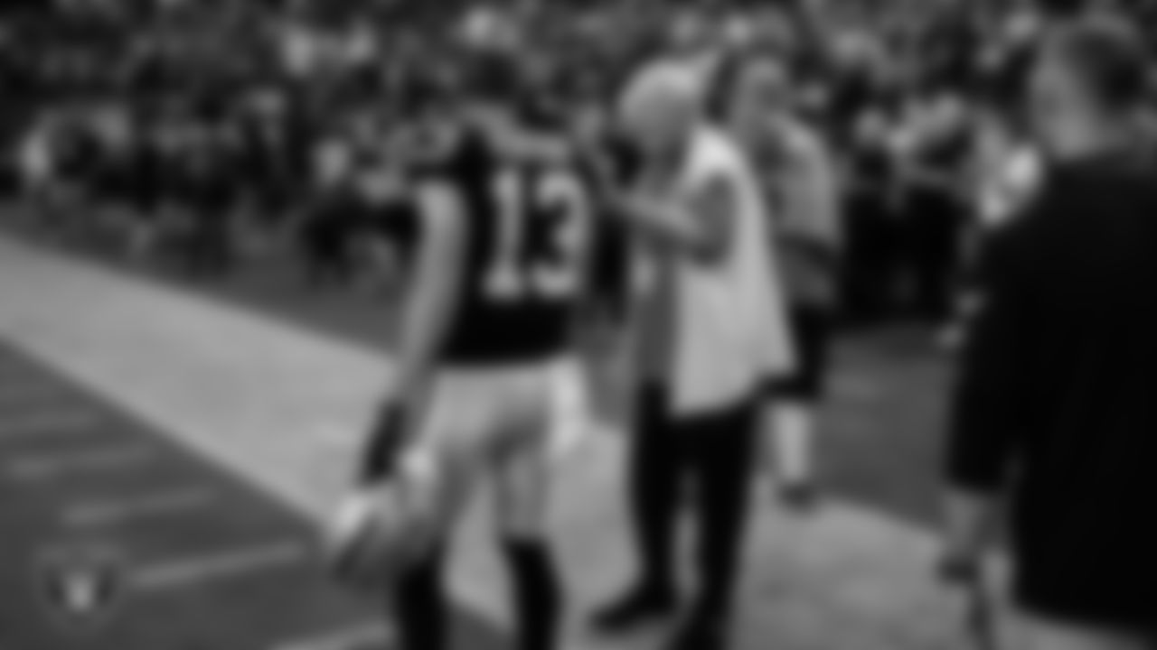 Las Vegas Raiders wide receiver Hunter Renfrow (13) and alumnus Fred Biletnikoff before the regular season home game against the Green Bay Packers at Allegiant Stadium.
