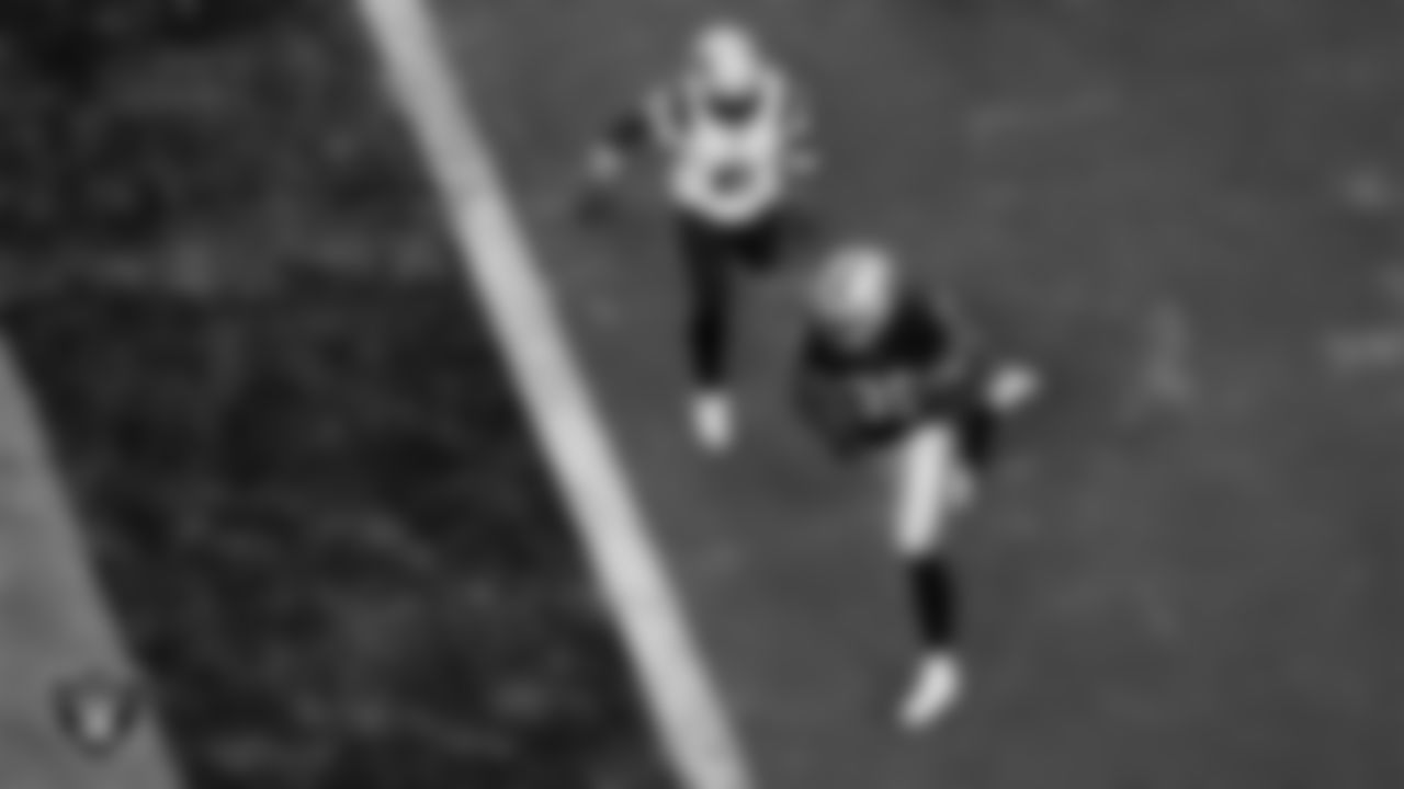 Las Vegas Raiders running back Zamir White (35) rushes for a 4-yard touchdown during the preseason home game against the New England Patriots at Allegiant Stadium.