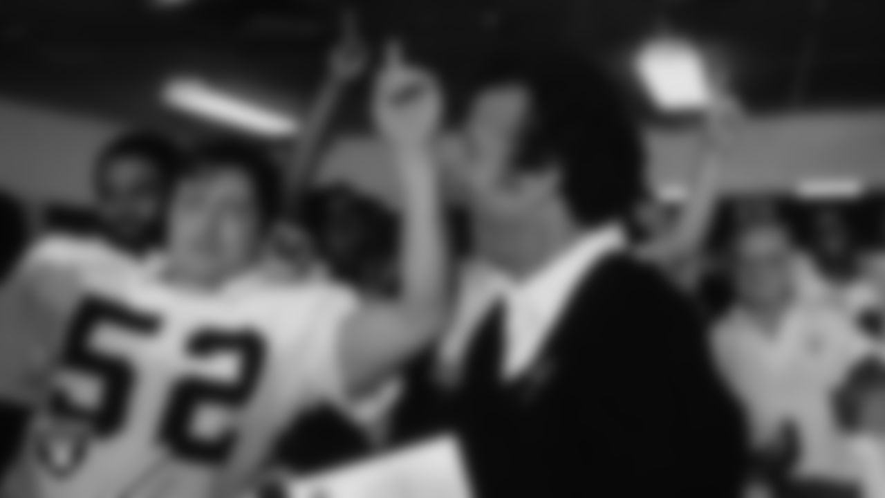 Oakland Raiders linebacker Mario Celotto (52) and Head Coach Tom Flores in the locker room after Super Bowl XV against the Philadelphia Eagles.