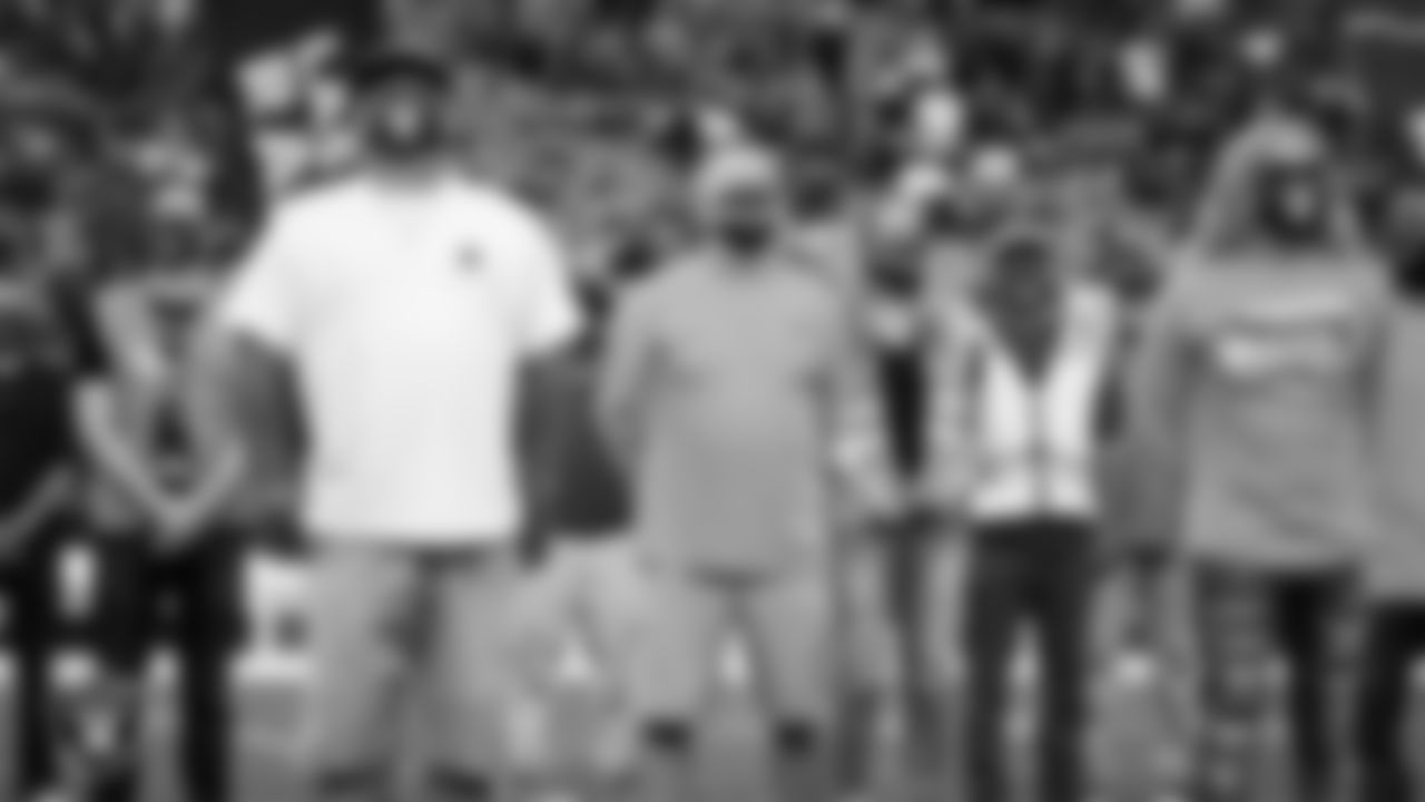 Frontline workers are honored on the field before the Las Vegas Raiders preseason home game against the Seattle Seahawks at Allegiant Stadium.
