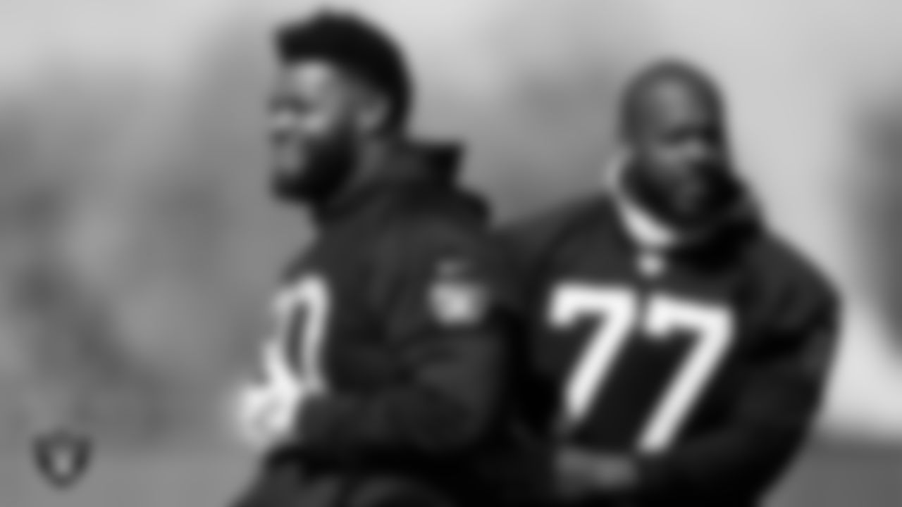 Las Vegas Raiders defensive tackle Johnathan Hankins (90) and defensive tackle Quinton Jefferson (77) during practice at Intermountain Healthcare Performance Center.