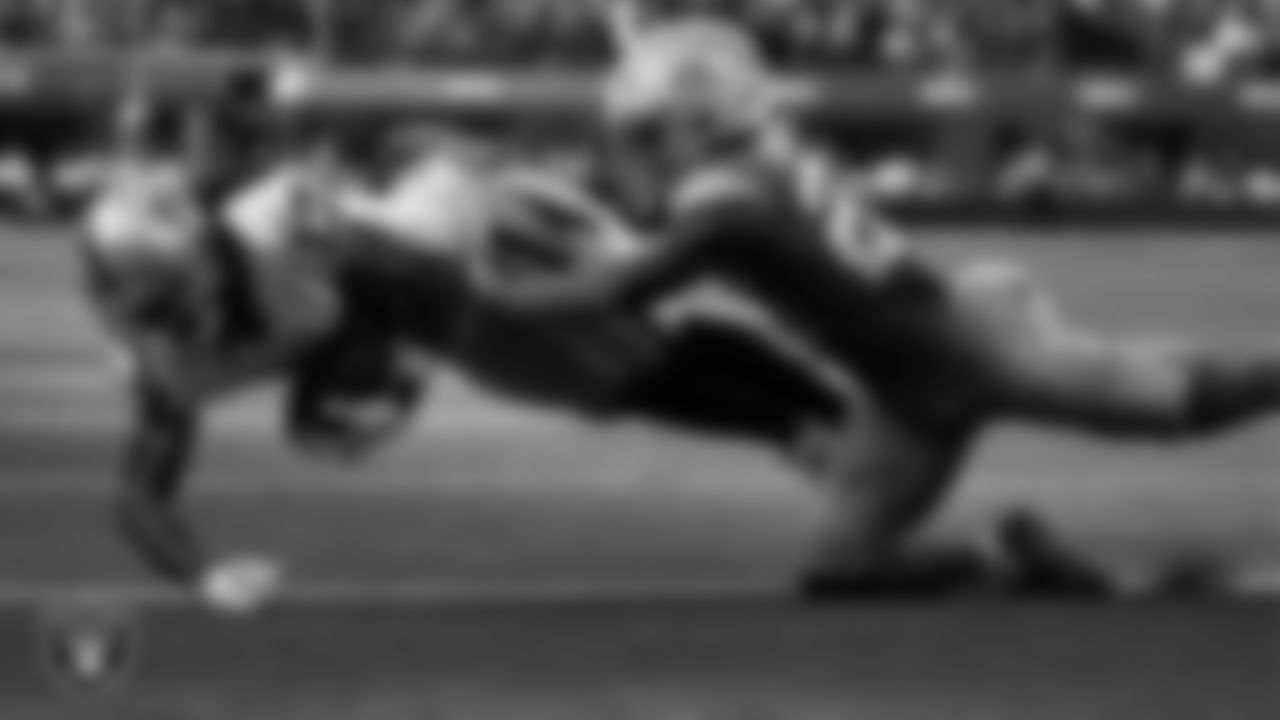 Las Vegas Raiders wide receiver Davante Adams (17) makes a 3-yard touchdown catch during the regular season away game against the Los Angeles Chargers at SoFi Stadium.