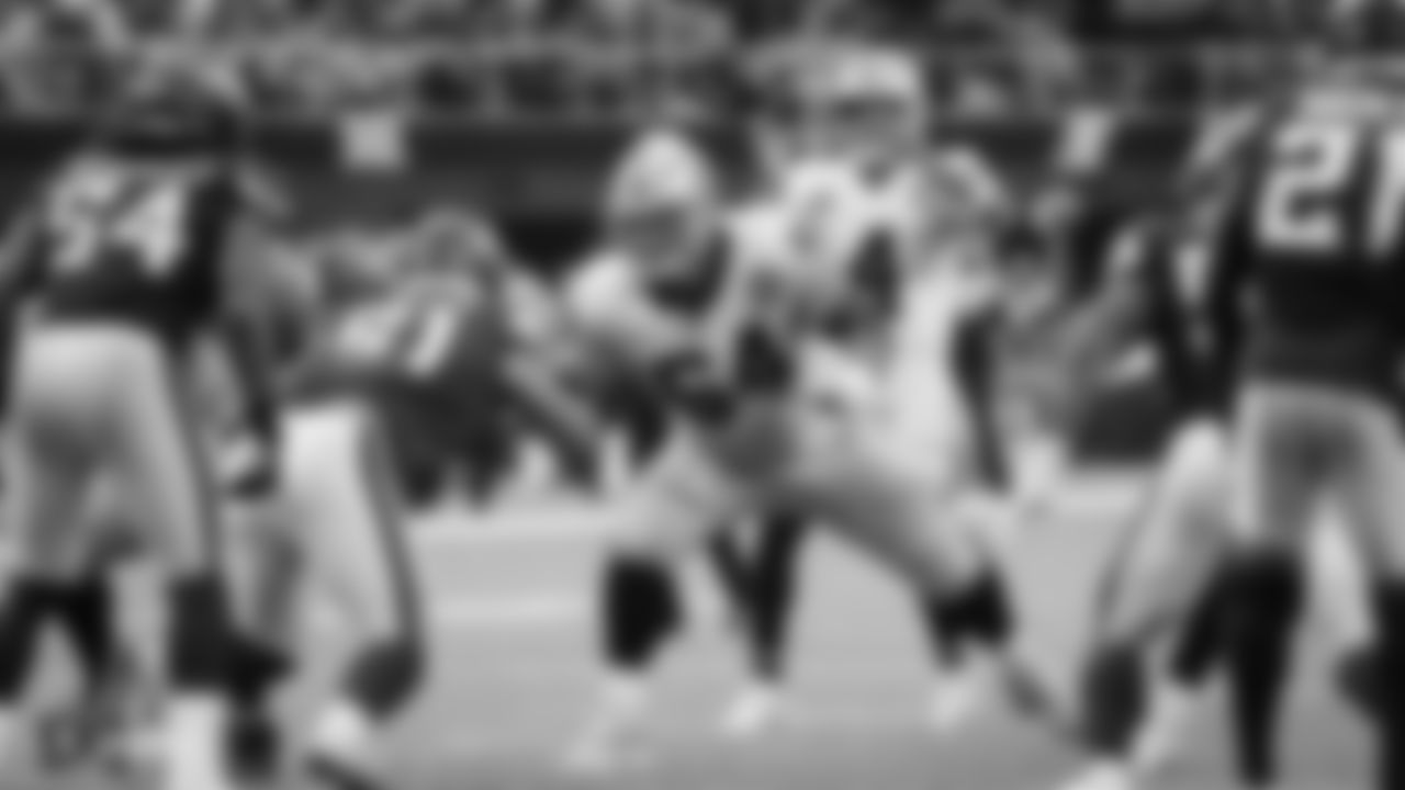 Raiders guard Richie Incognito (64) blocks for quarterback Derek Carr (4) during the Raiders regular season game against the Minnesota Vikings.