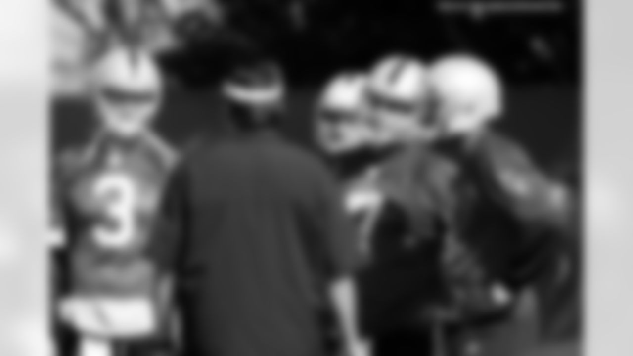 Offensive coordinator Greg Knapp works with the QBs - Carson Palmer, Kyle Newhall-Caballero, Matt Leinart, and Terrelle Pryor.