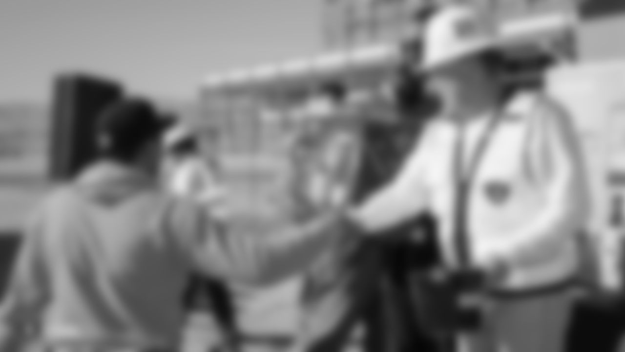 Raiders Owner Mark Davis helps hand out raffle prizes to construction workers of the Raiders Headquarters and Intermountain Healthcare Performance Center worksite during a lunch hosted by the Raiders front office.