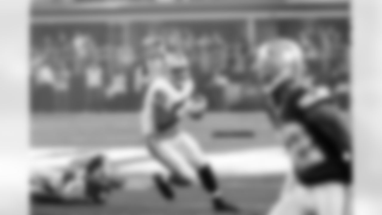 TE Mychal Rivera catches the pass and makes a defender miss.