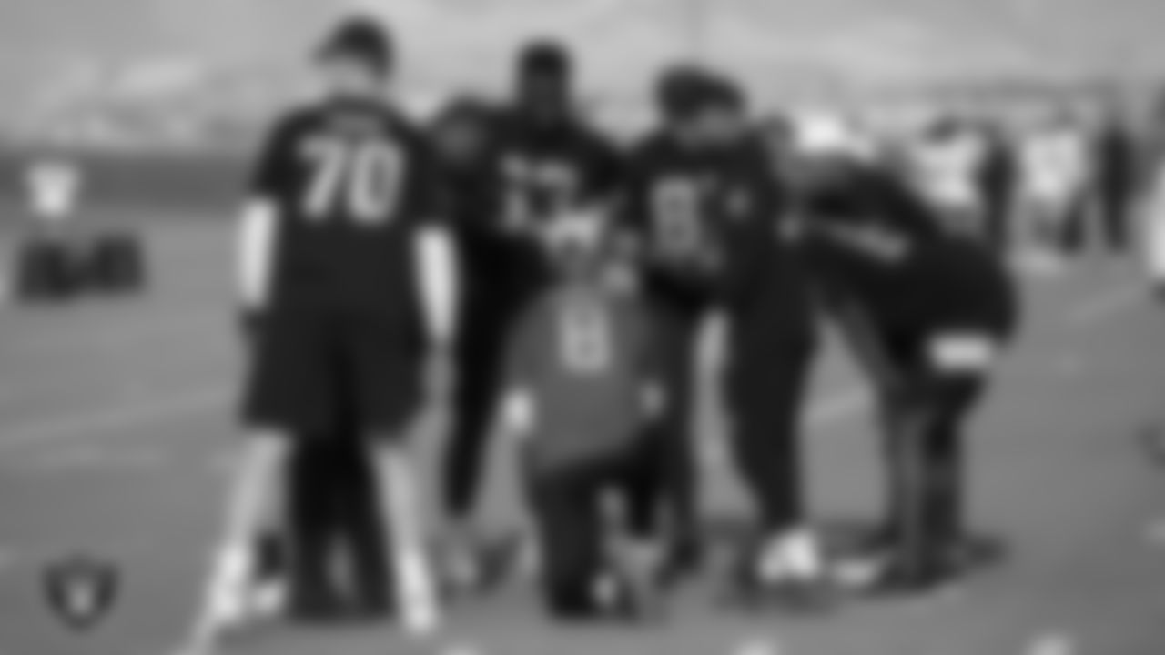 Las Vegas Raiders tackle Sam Young (70), guard Lester Cotton Sr. (67), guard John Simpson (76), tackle Kamaal Seymour (63), tight end Foster Moreau (87), wide receiver Zay Jones (12), wide receiver Bryan Edwards (89), running back Lynn Bowden Jr. (33) and quarterback Marcus Mariota (8) on the field for practice at 2020 Training Camp.