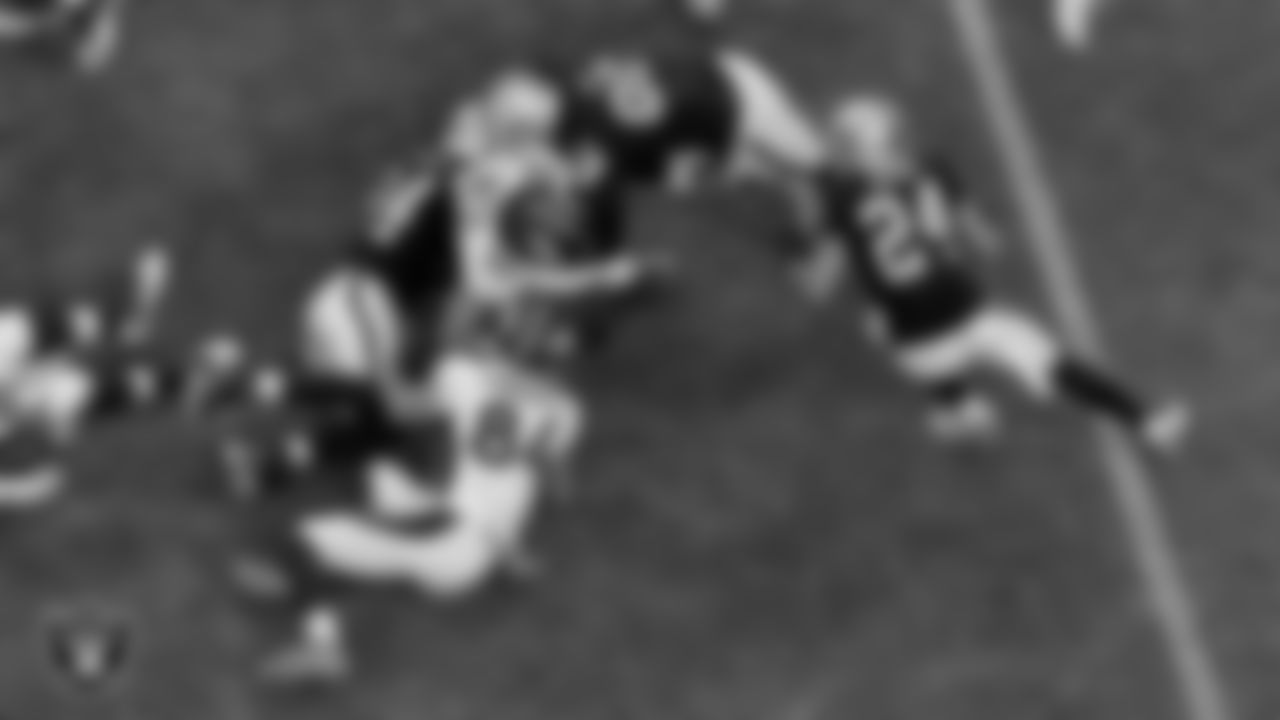 Las Vegas Raiders defensive end Carl Nassib (94), defensive end Arden Key (99) and safety Johnathan Abram (24) during the regular season game against the Denver Broncos at Allegiant Stadium.