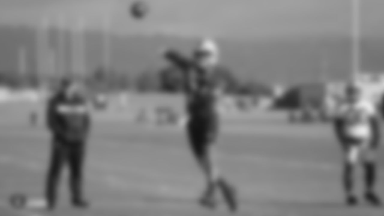 Raiders quarterback DeShone Kizer (14) passes during practice.