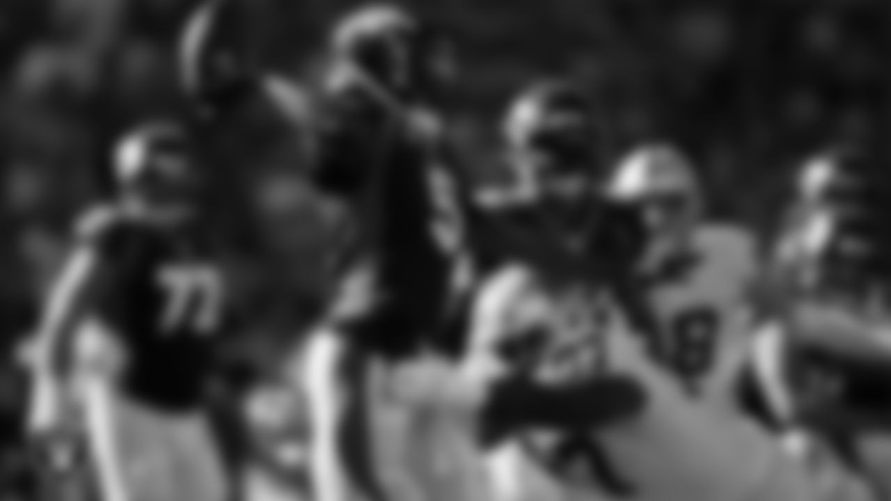 Las Vegas Raiders defensive tackle Damion Square (97) pressures the quarterback during the regular season away game against the Denver Broncos.