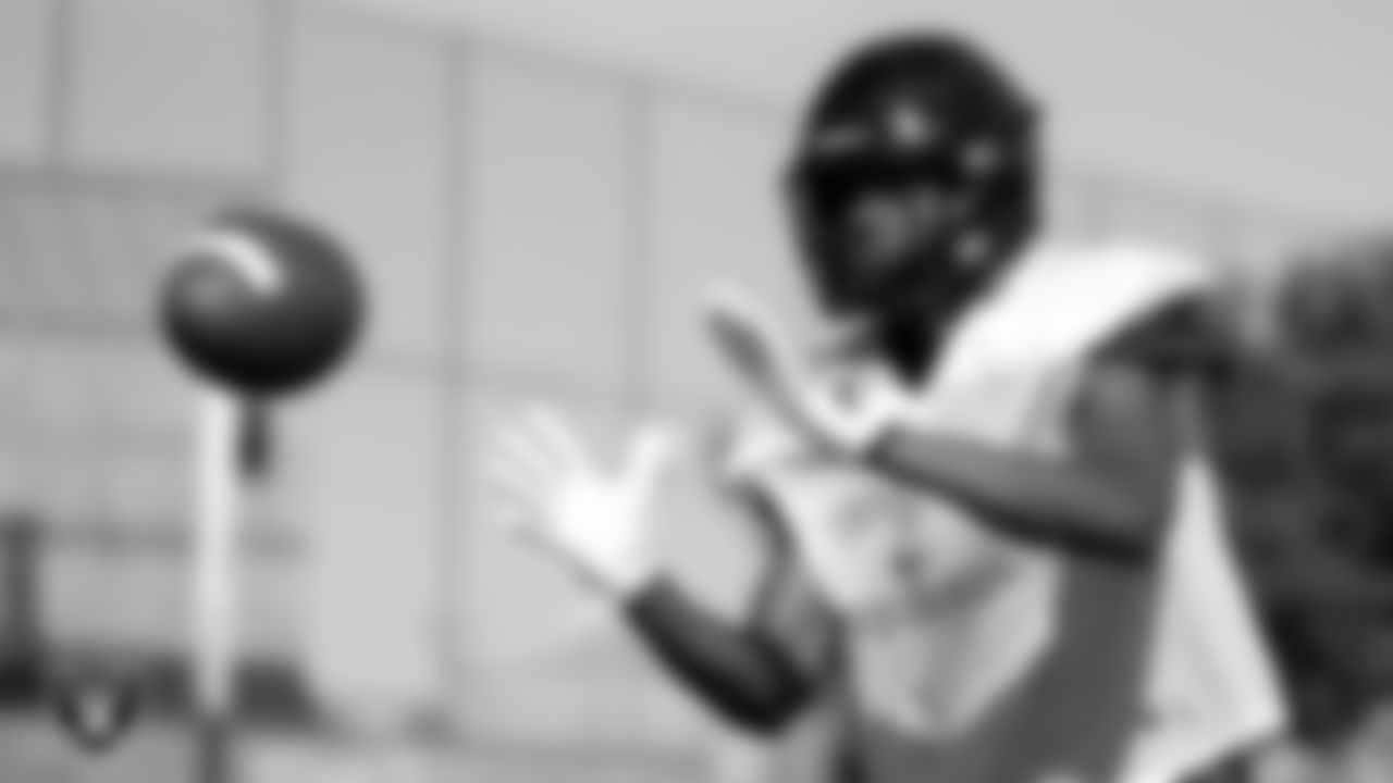A member of the Durango High School football team makes a catch during practice at Durango High School.