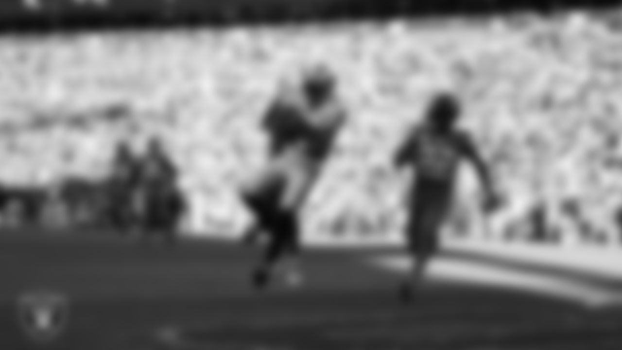 Las Vegas Raiders wide receiver Davante Adams (17) makes a 31-yard touchdown catch during the regular season away game against the Denver Broncos at Empower Field at Mile High, Sunday, November 20, 2022, in Denver, Colo.