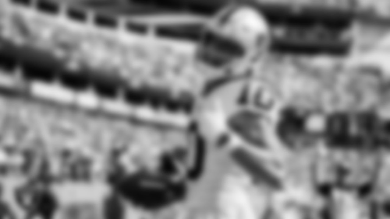 Las Vegas Raiders wide receiver Mack Hollins (10) celebrates after making a 9-yard touchdown catch during the regular season away game against the Tennessee Titans at Nissan Stadium.