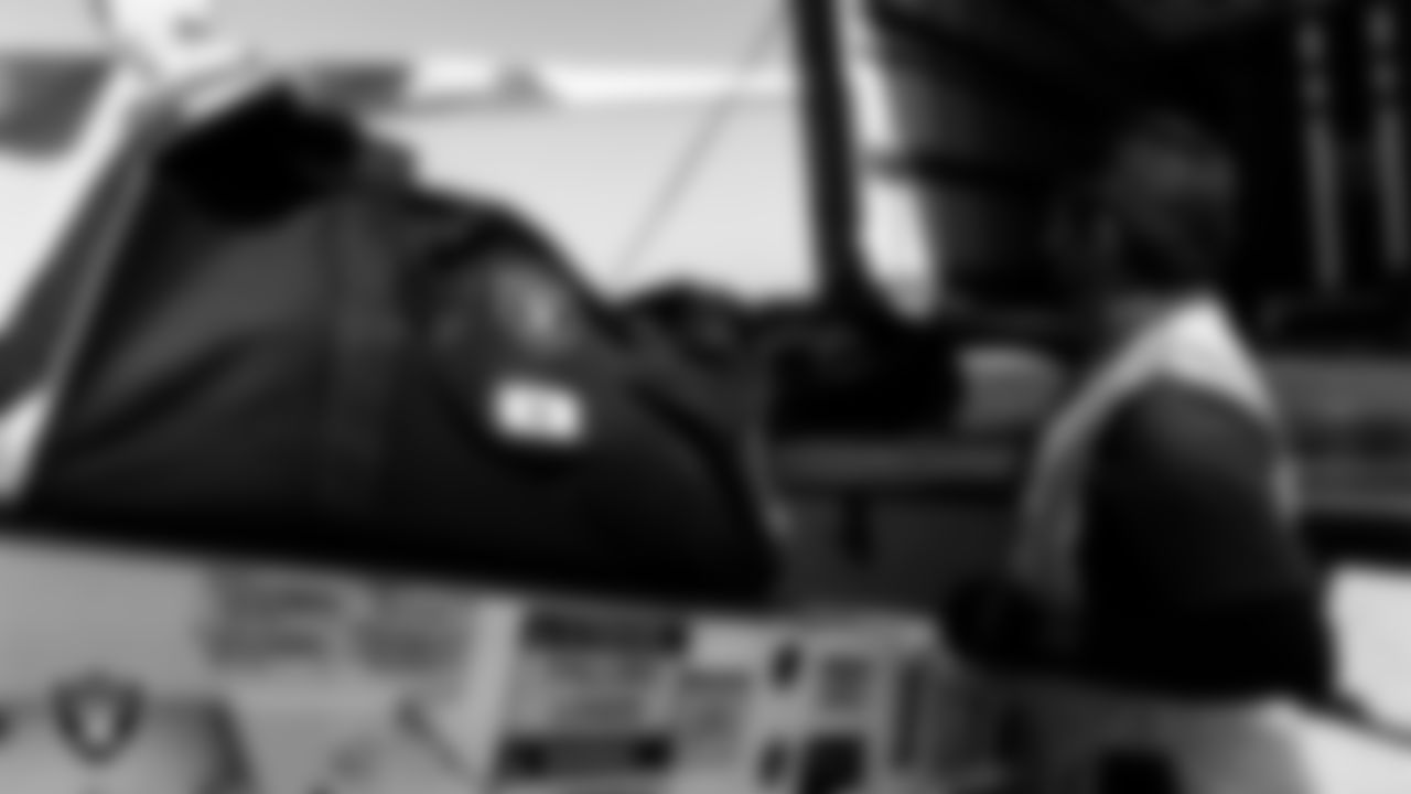 Las Vegas Raiders tackle Kolton Miller's (74) duffel bag is loaded on the plane before the team departs for the regular season away game against the New England Patriots.